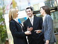 Woman introduces client at event